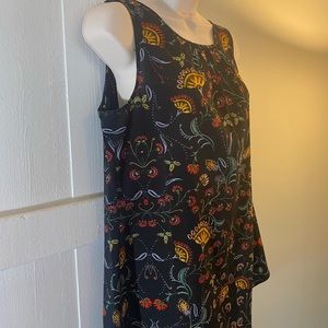 CAbi blouse. Black, red, gold…size medium